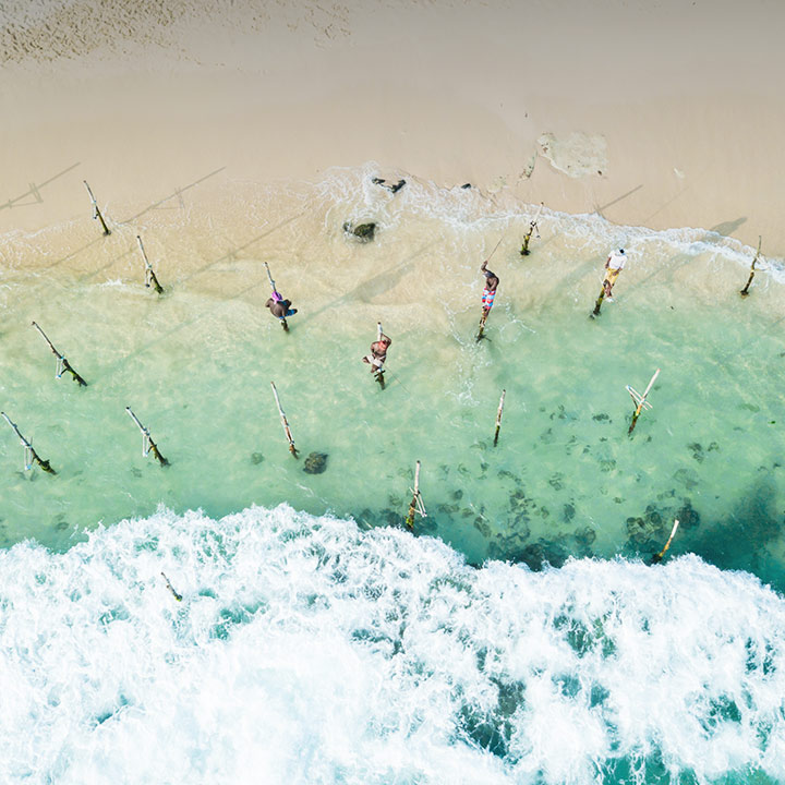 Aerial view of stilt fisherman 