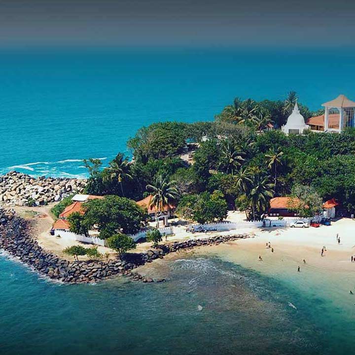 Aerial image of temple by the beach in Galle