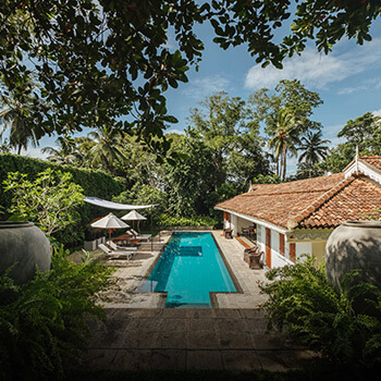 View of pool area at Leela Walauwwa by Taru Villas